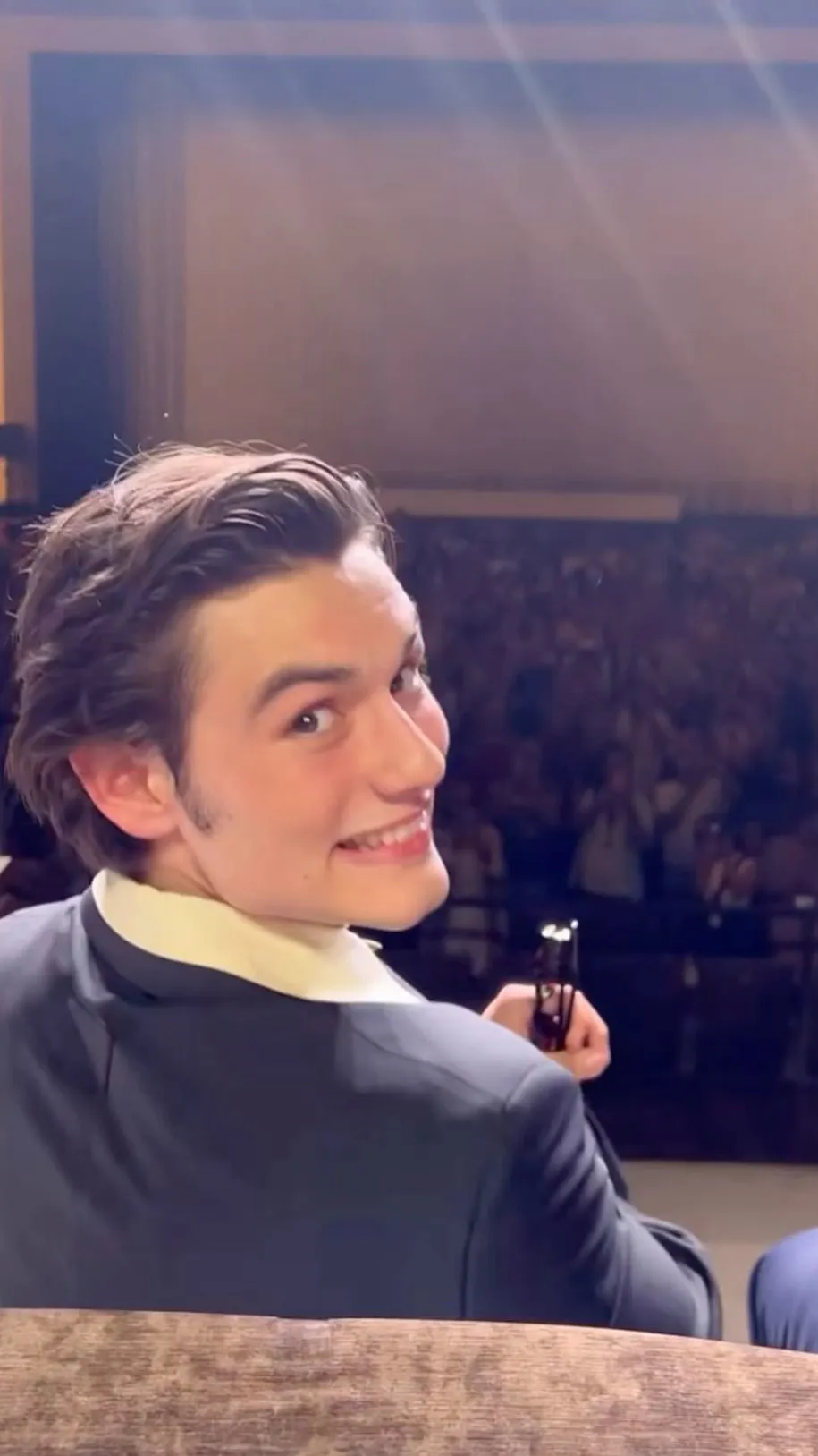 ai character: Louis Partridge  background