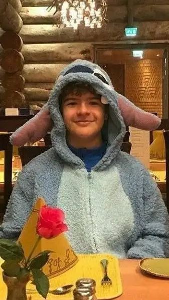 ai character: Dustin Henderson background