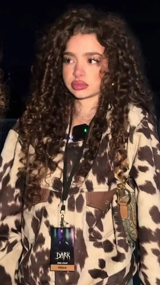 ai character: Demitra kalogeras  background