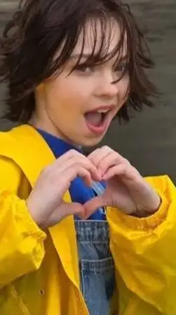 ai character: Emma Myers  background