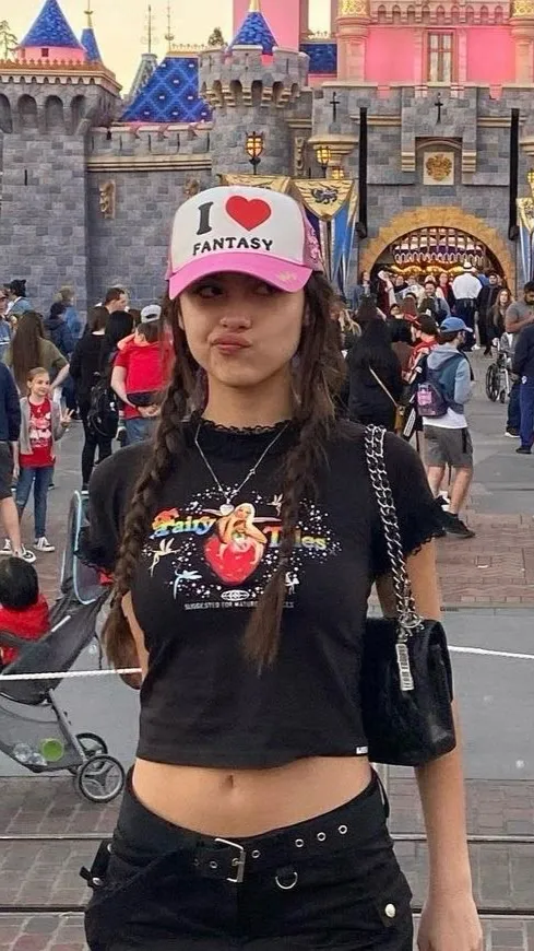 ai character: Olivia Rodrigo  background