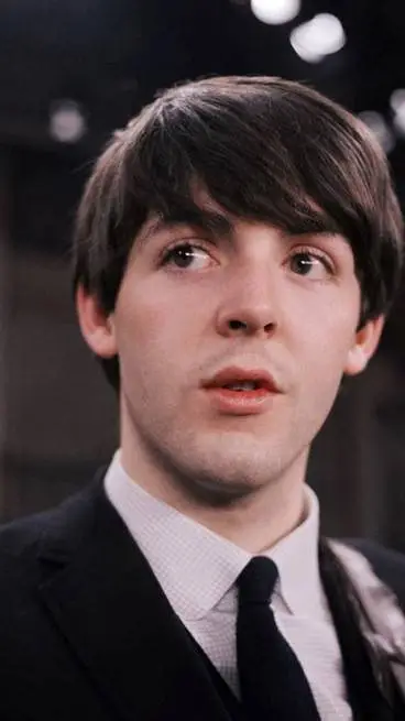 ai character: Paul McCartney  background