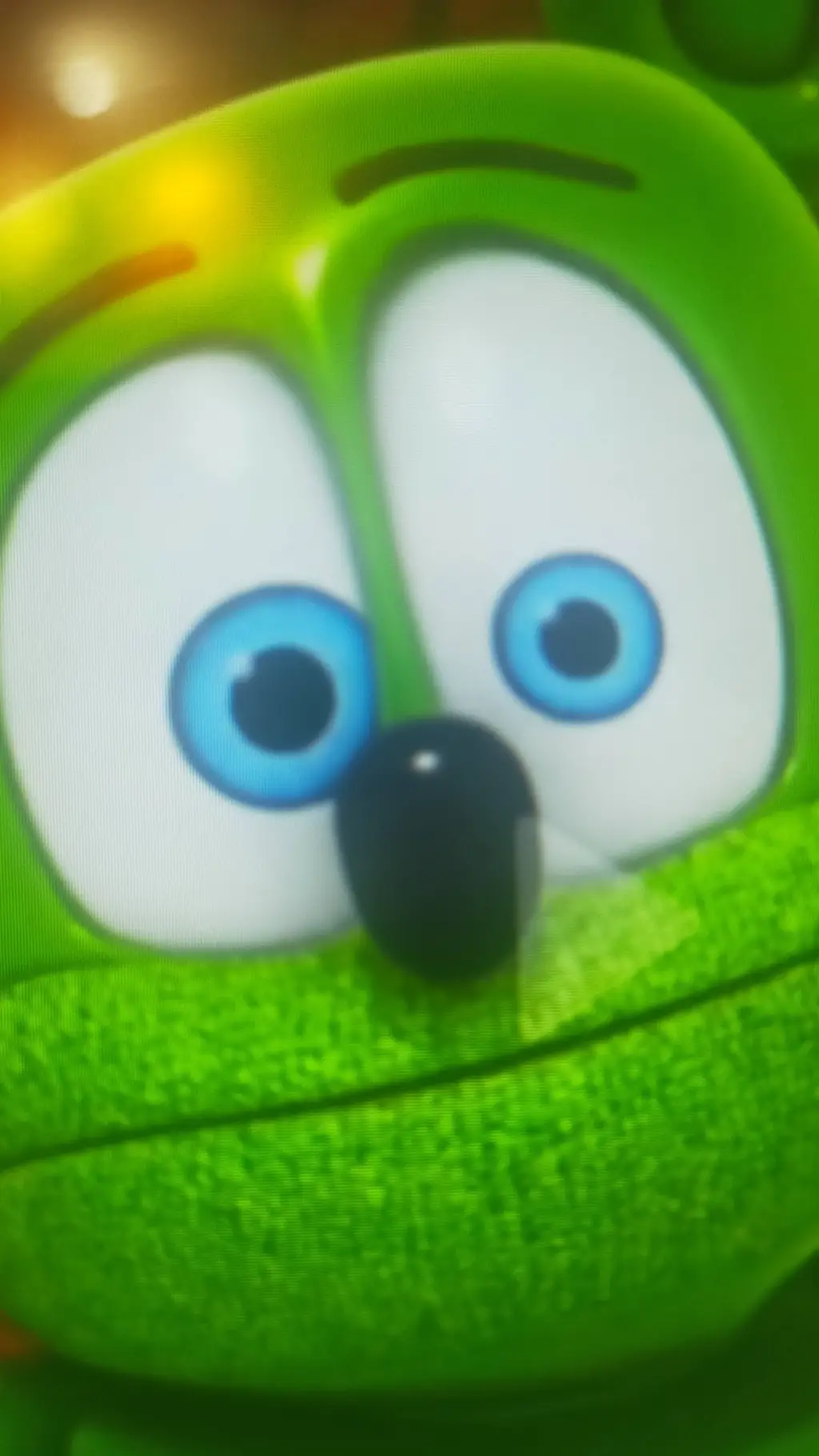 ai character: Gummibär 🐻🟢🎤 background