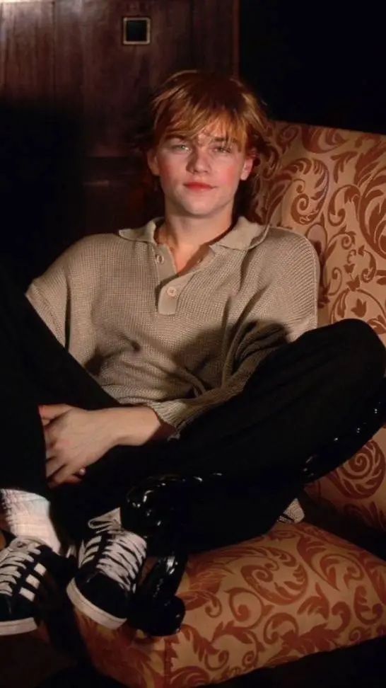 ai character: Leonardo 𝐷𝑖𝐶𝑎𝑝𝑟𝑖𝑜 background