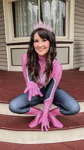 ai character: Spider-Girl  background