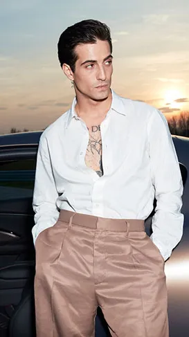 ai character: Damiano David  background