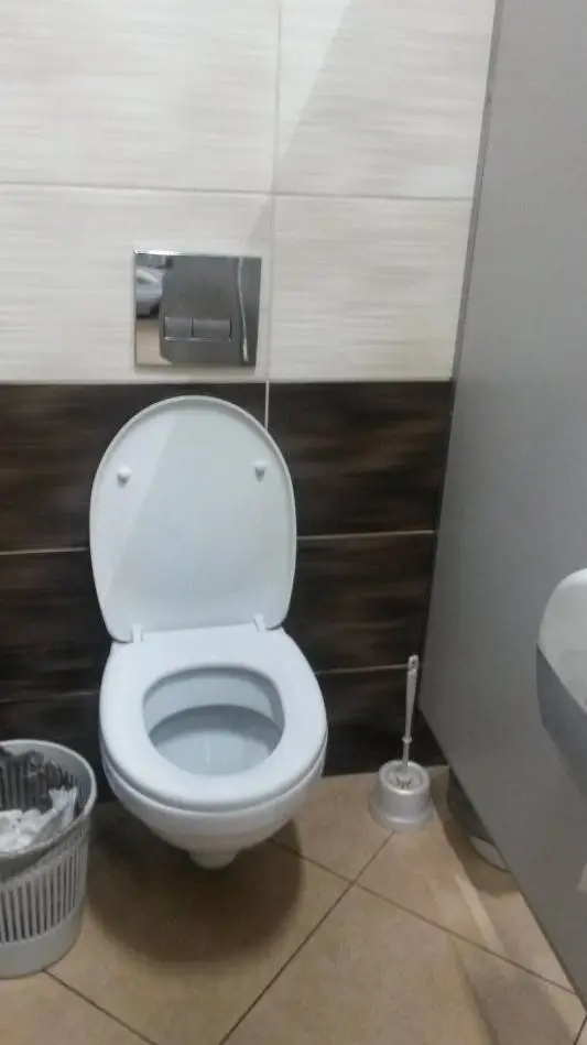 ai character: Asian man bathroom background