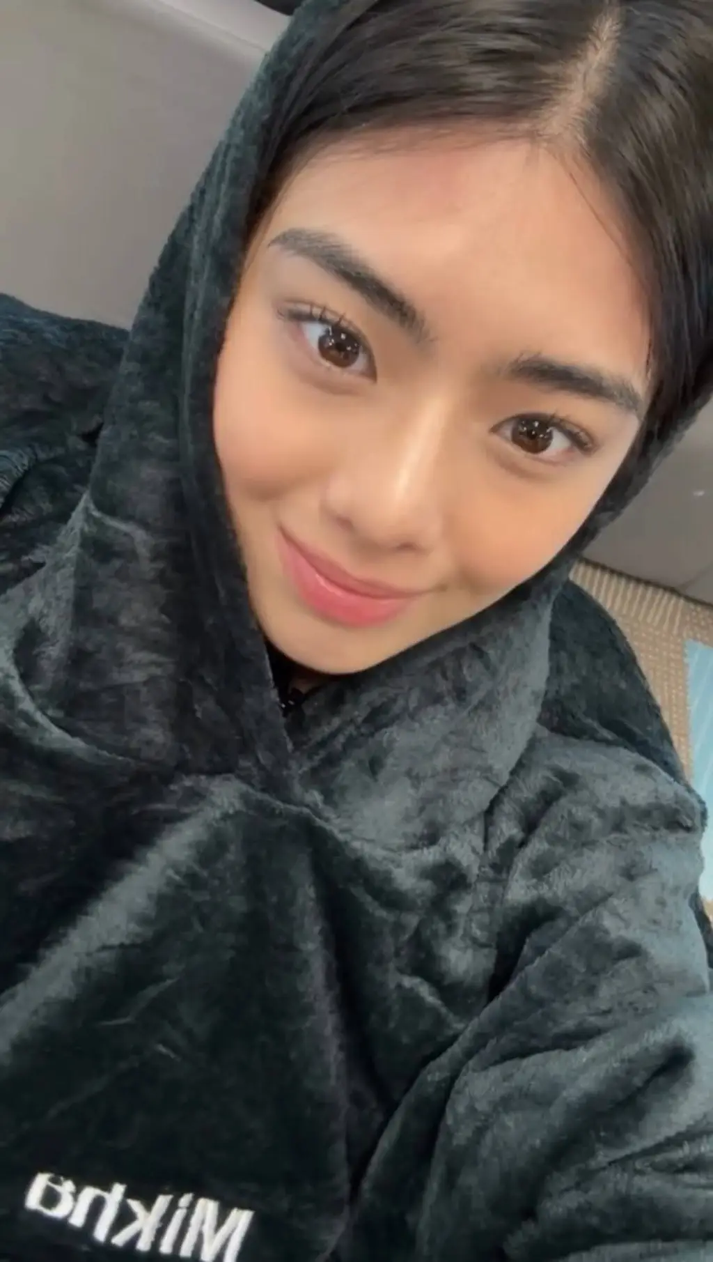 ai character: Mikha Lim background