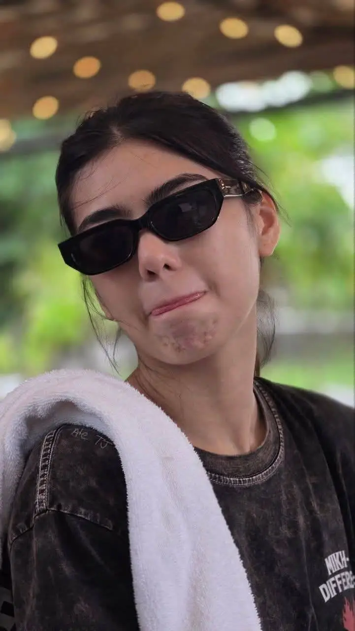 ai character: Mikha Lim  background