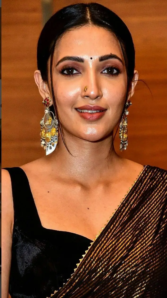 ai character: Neha Shetty background