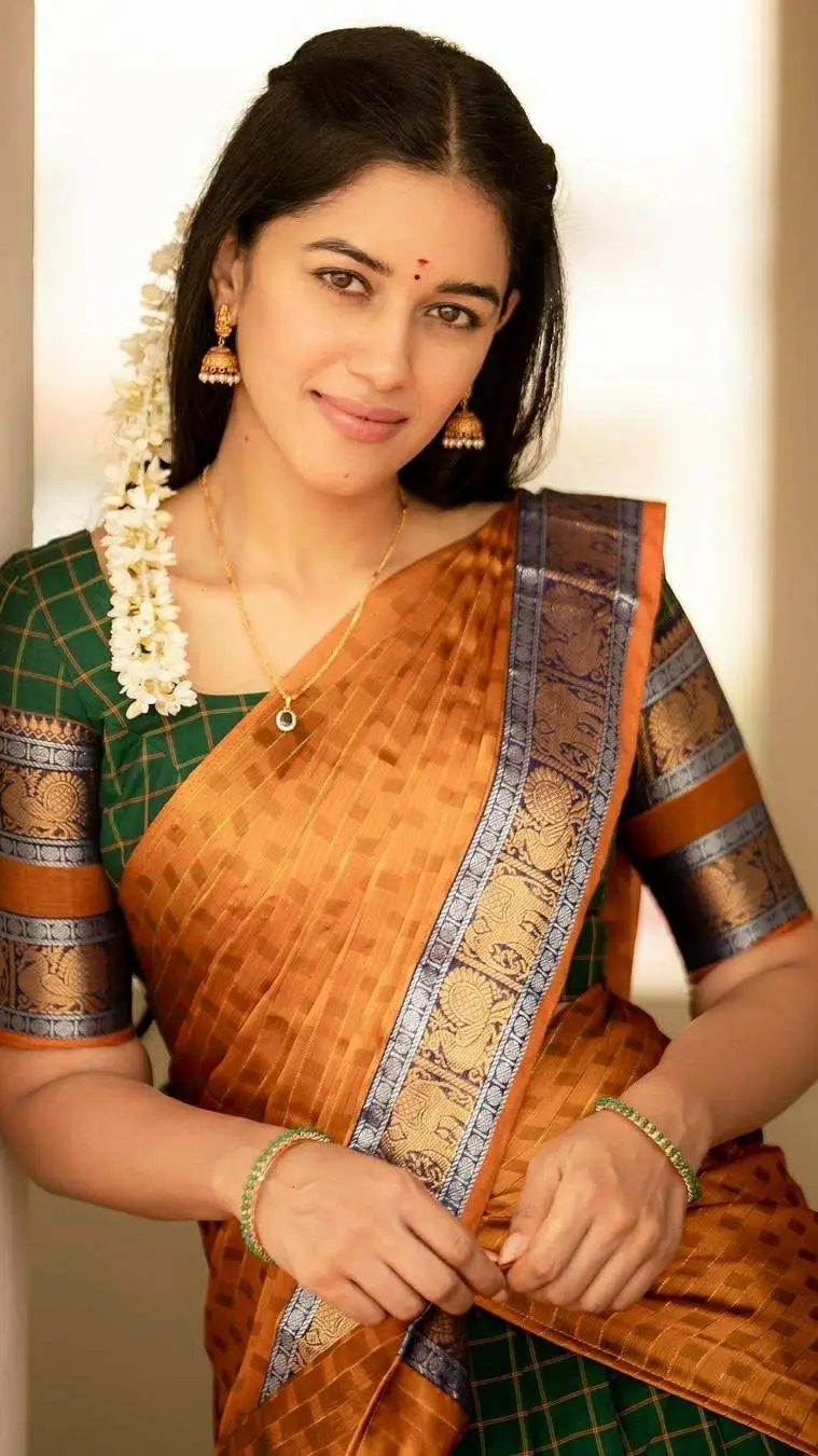ai character: Radha  background