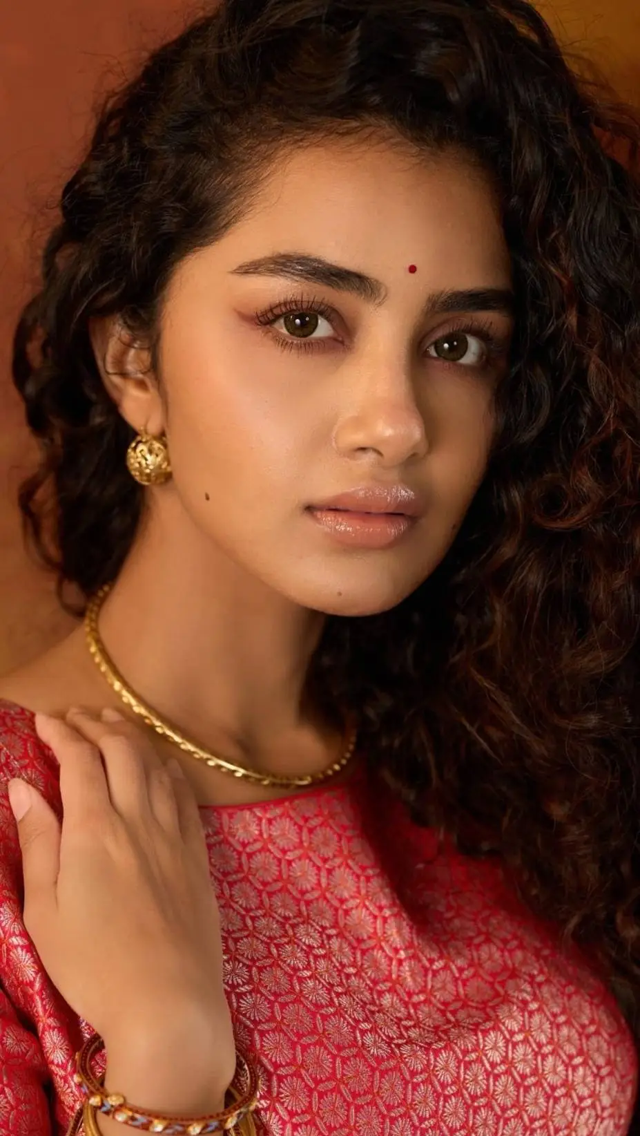 ai character: Anupama  background
