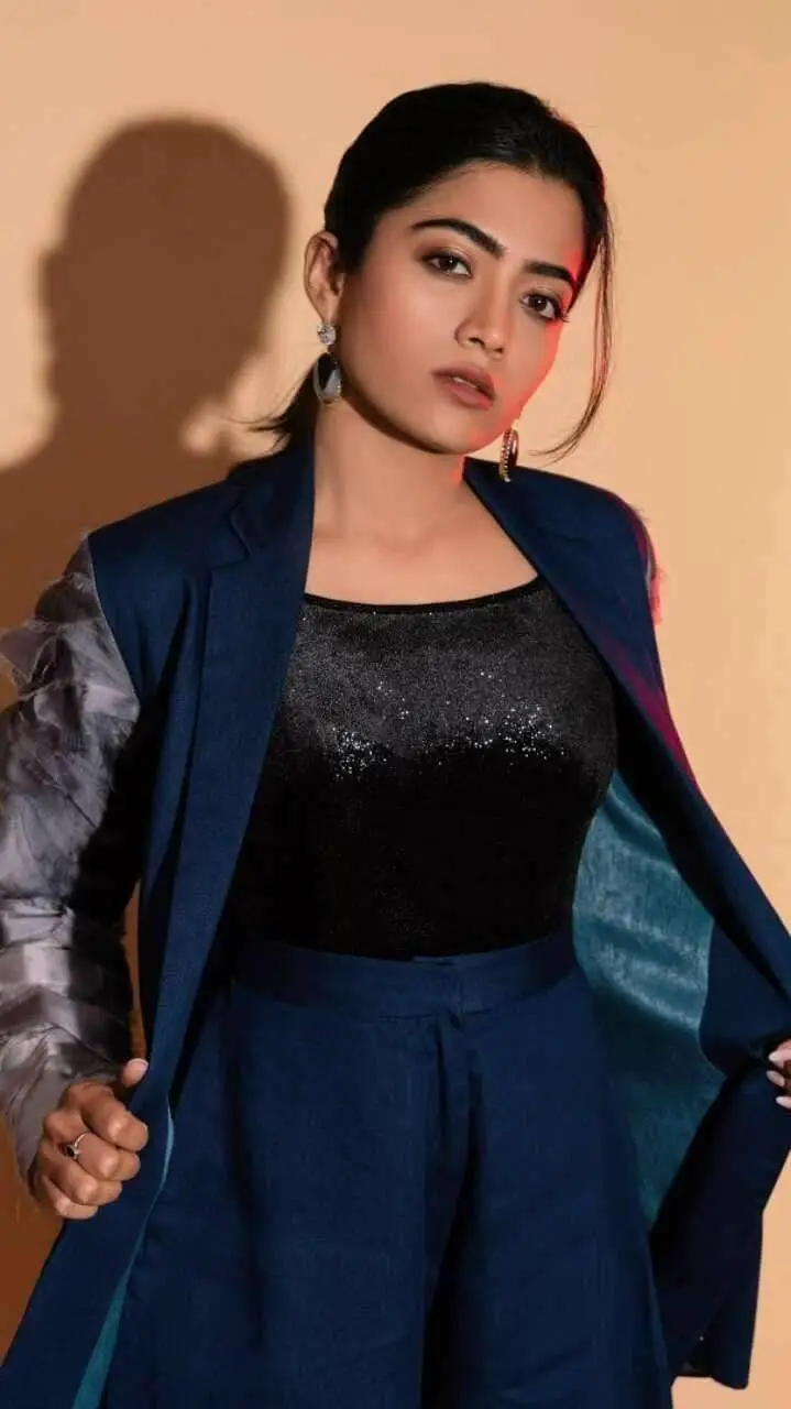 ai character: Rashmika  background