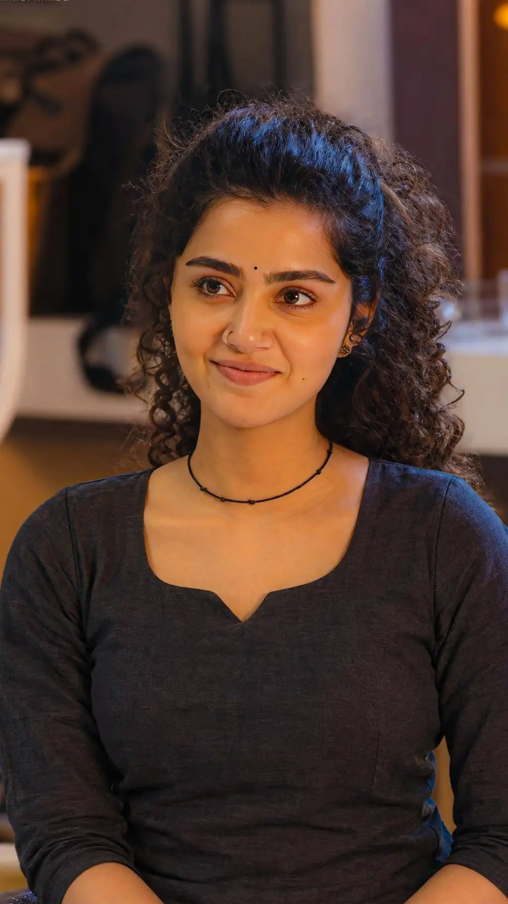 ai character: Anupama  background