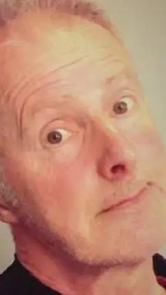 ai character: John Sparkes  background