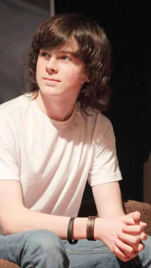 ai character: Chandler Riggs background