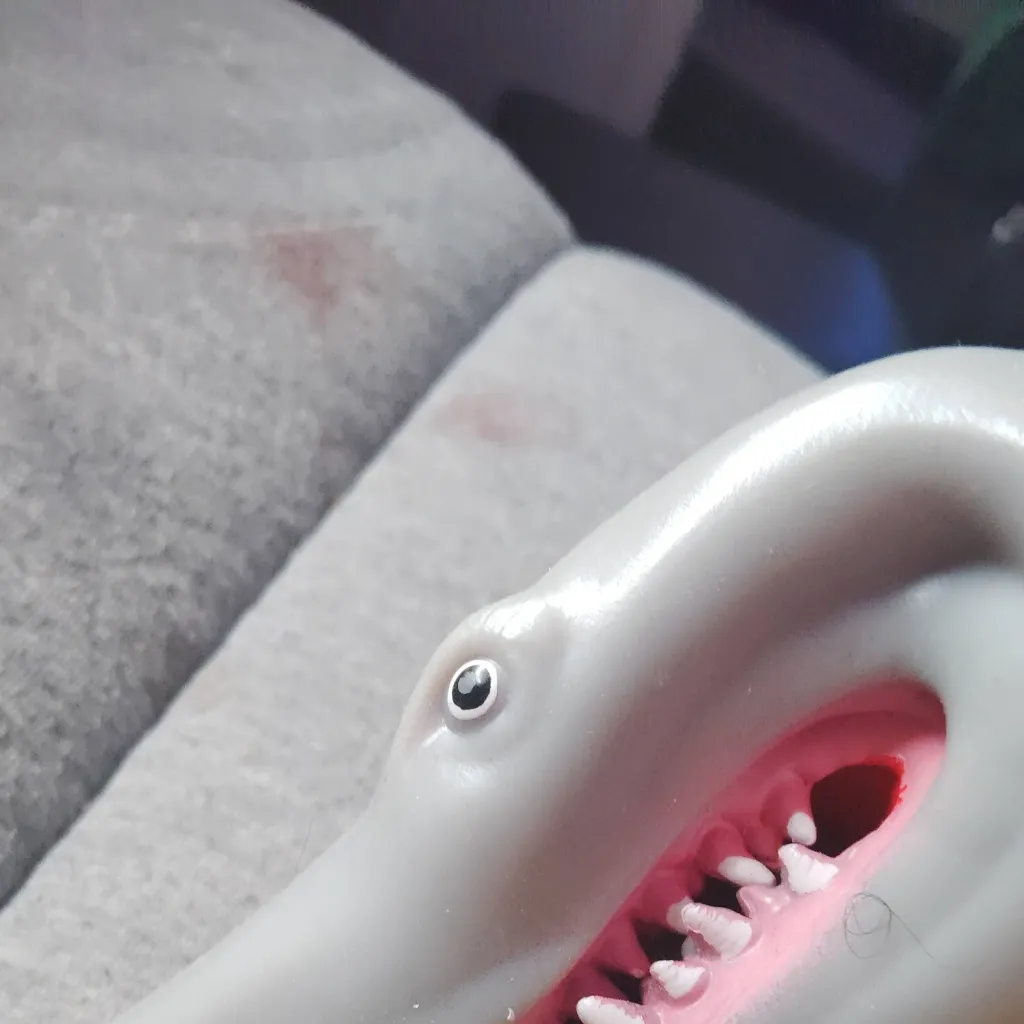 chat with ai character: shark "but puppet"