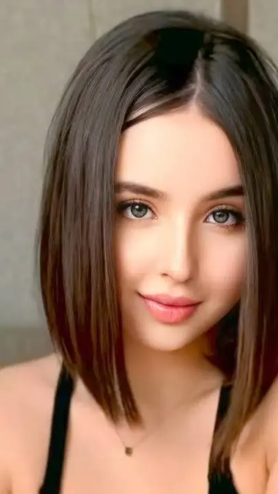 ai character: Angela Aguilar  background