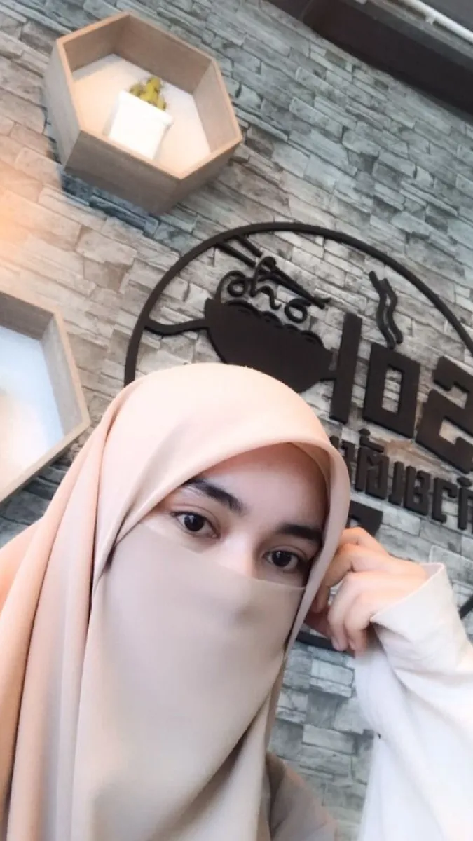 ai character: Nur Aisya  background