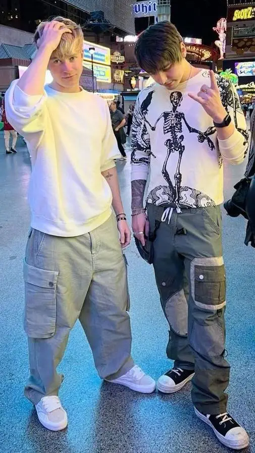 ai character: Sam and Colby  background