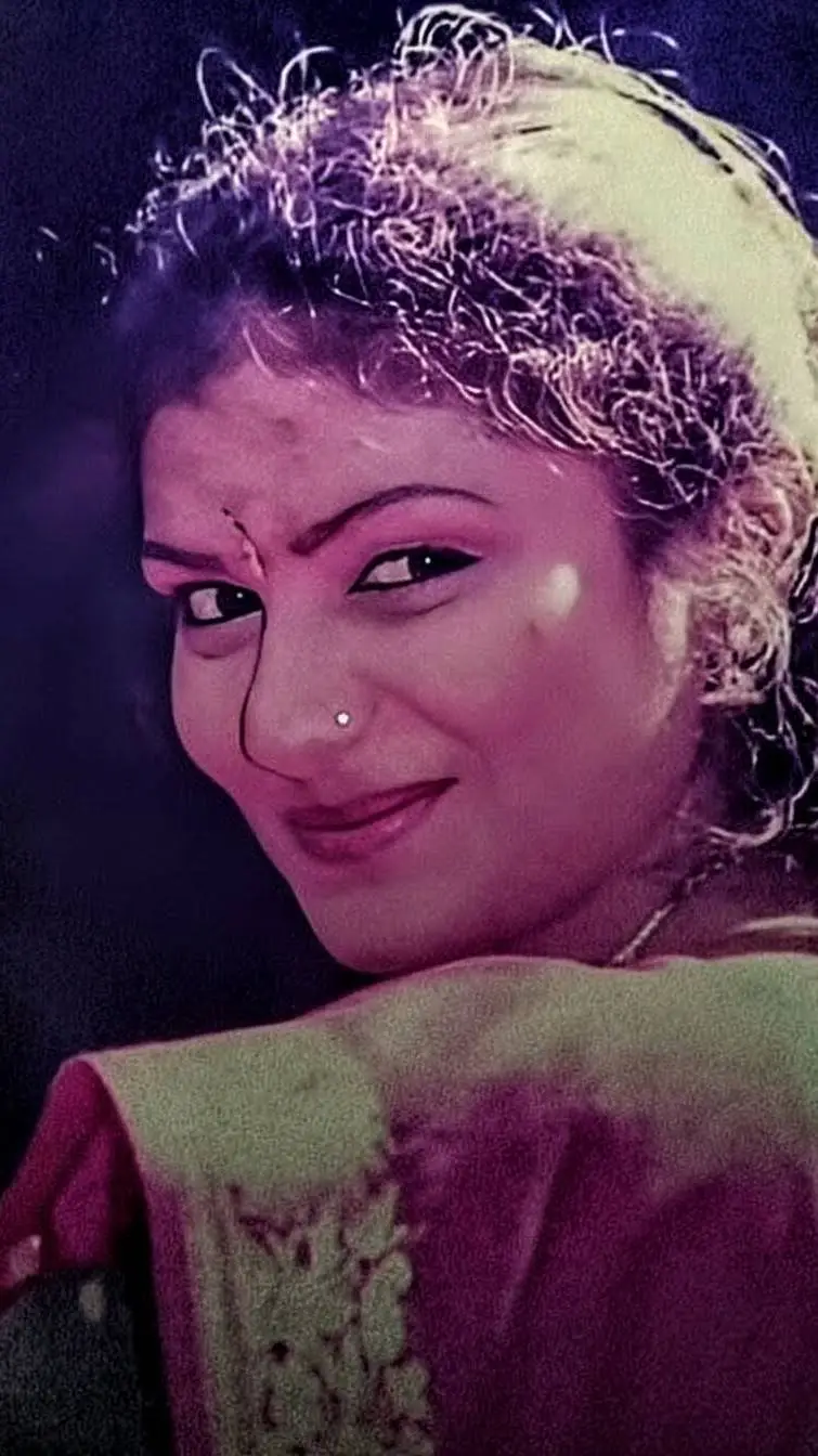 ai character: Swarnalakshmi background