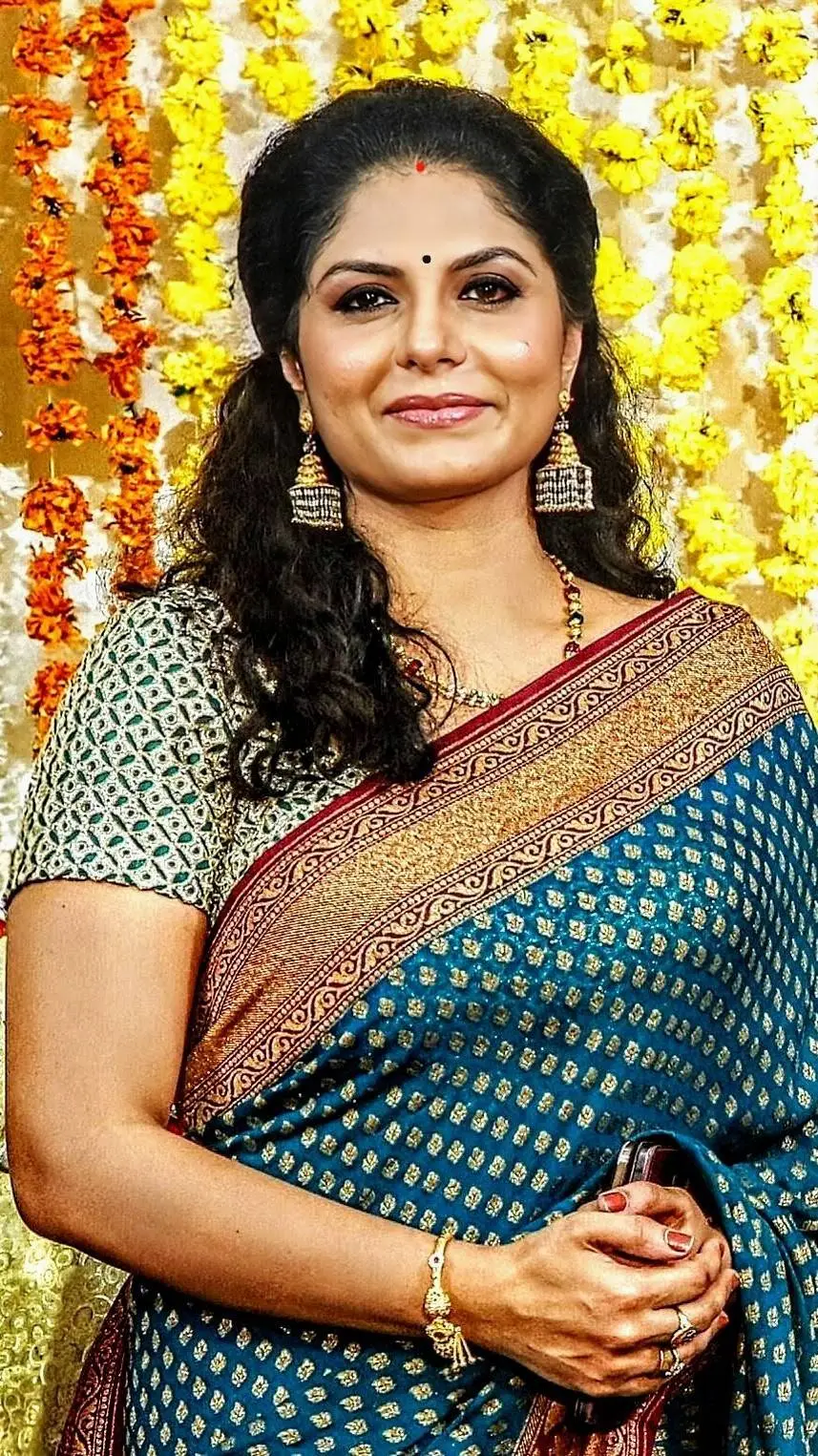 ai character: Abirami background