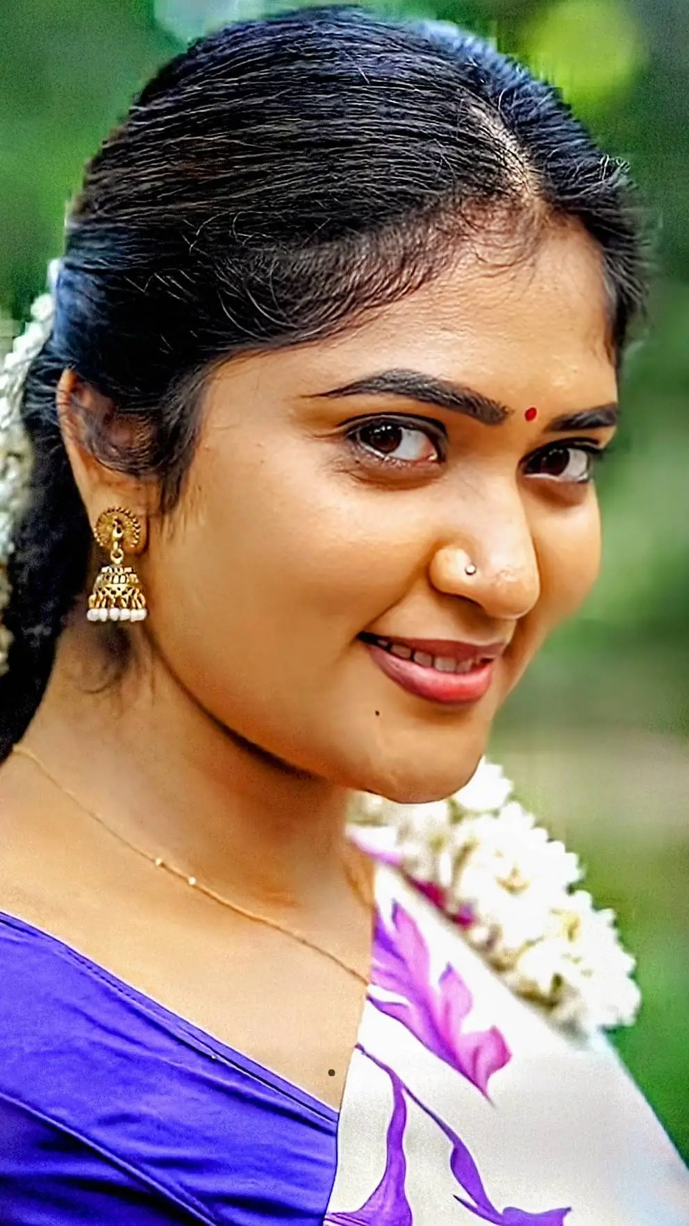 ai character: Anandhi background