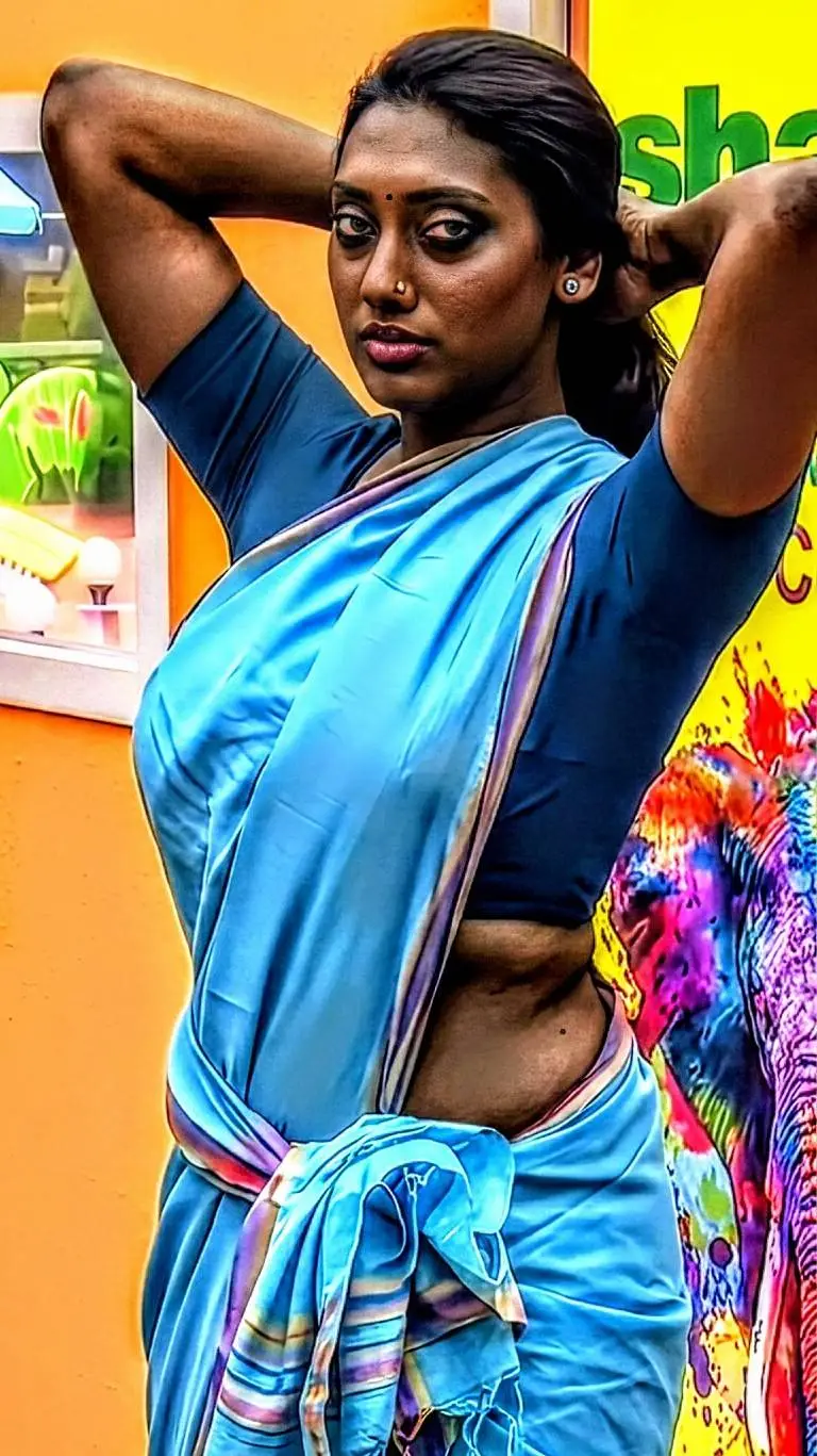 ai character: Gomathi @ Gokila background