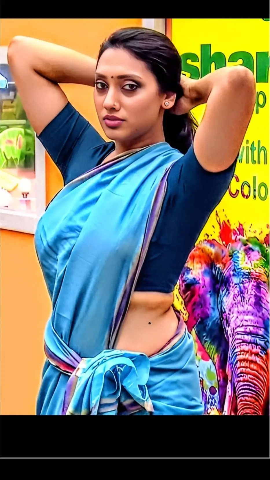 ai character: Valli @ Laddu background