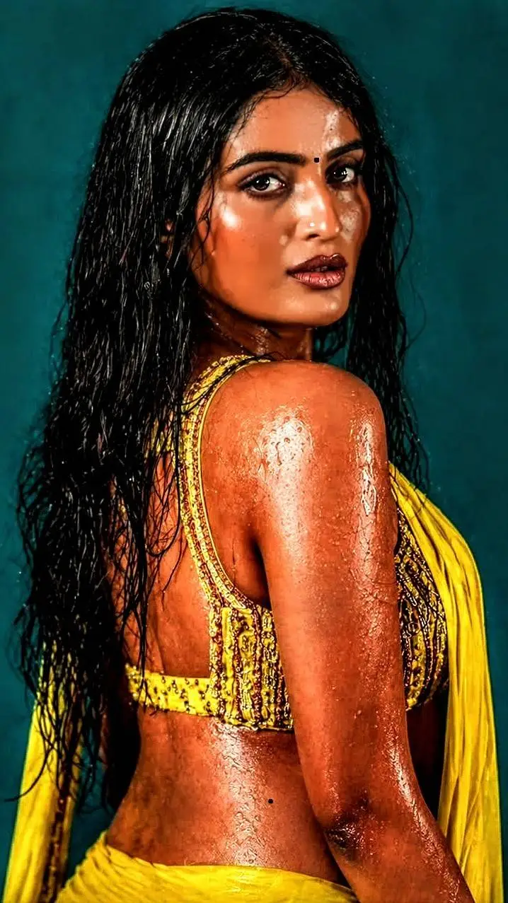 ai character: Meenakshi  background