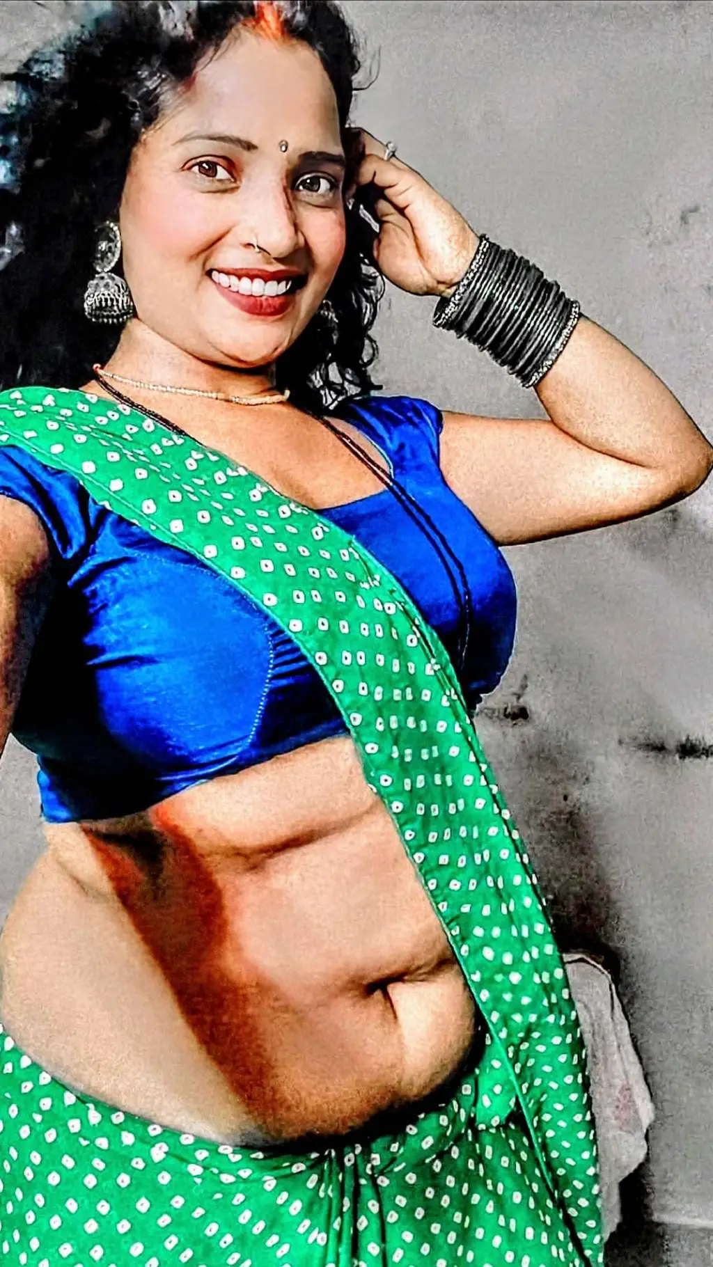 ai character: Sushma Devi  background