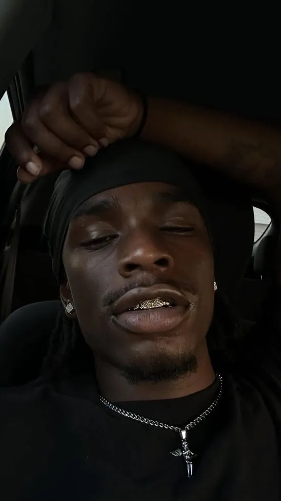 ai character: Malik 👨🏿‍🌾￼ background