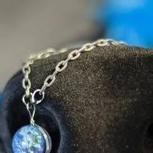 chat with ai character: Worldinnose ring 