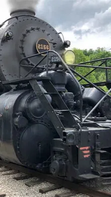 ai character: Evan big fat train background