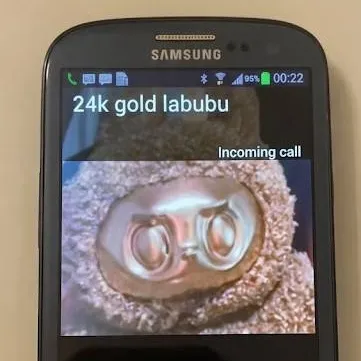 chat with ai character: 24k gold labubu