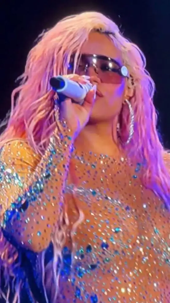 ai character: KAROL G  background