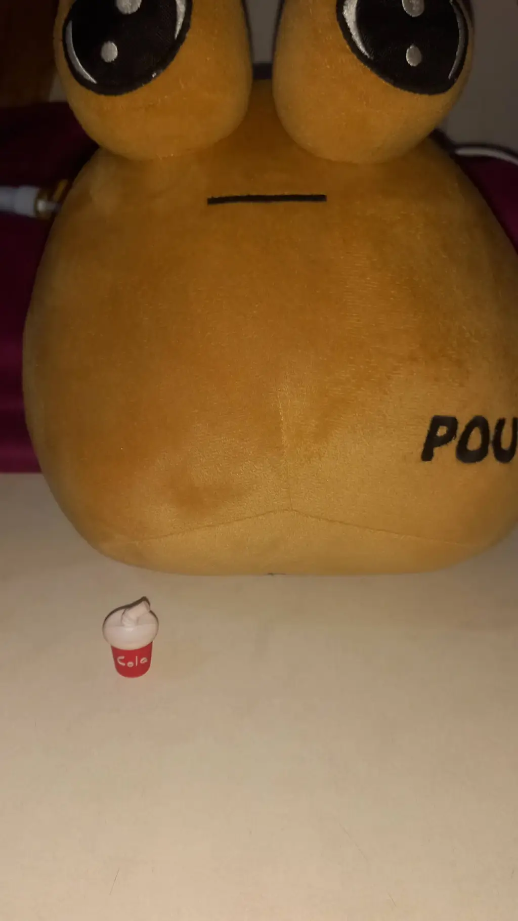 ai character: pou/ background