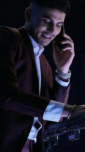 ai character: Shubman Gill background