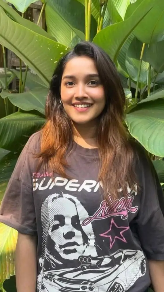 ai character: Anikha Surendran  background