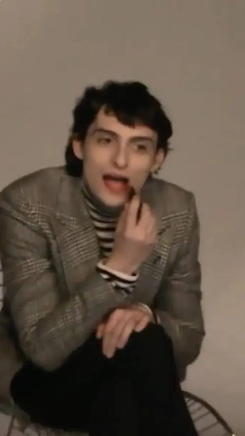 ai character: Finn wolfhard  background