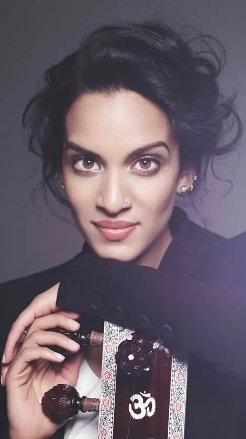 ai character: Anoushka Shankar  background
