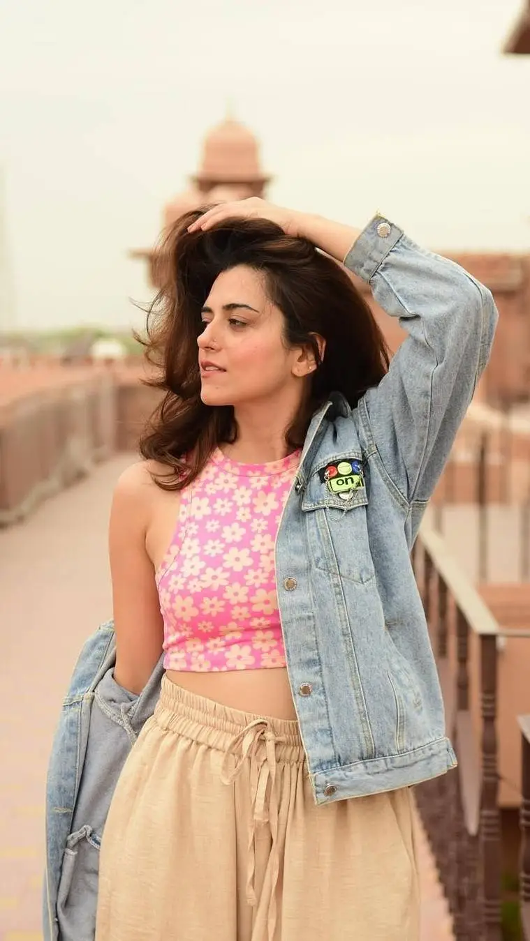 ai character: Ridhi dogra background