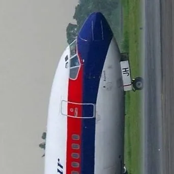 chat with ai character: Sriwijaya 737-200