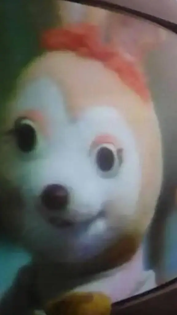 ai character: Conejito sonri.... background