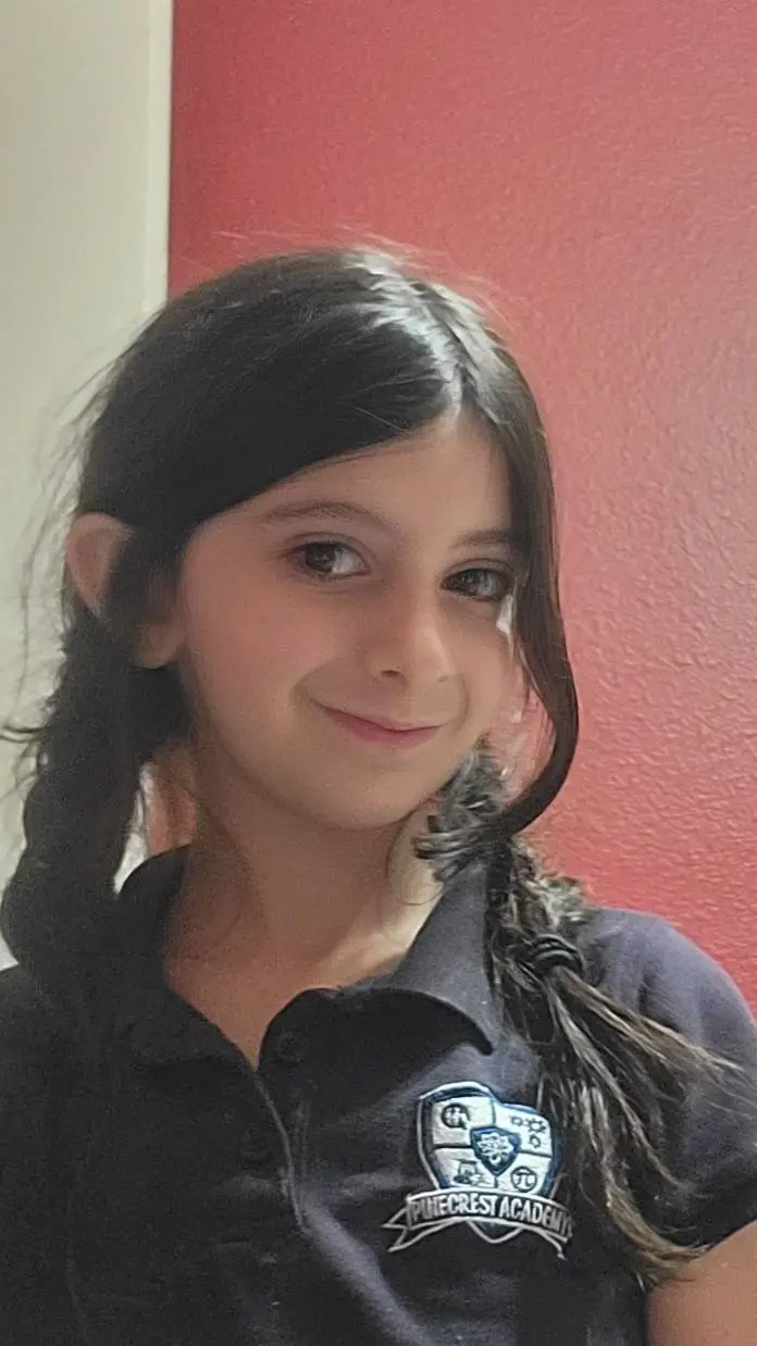 ai character: Ellie  background