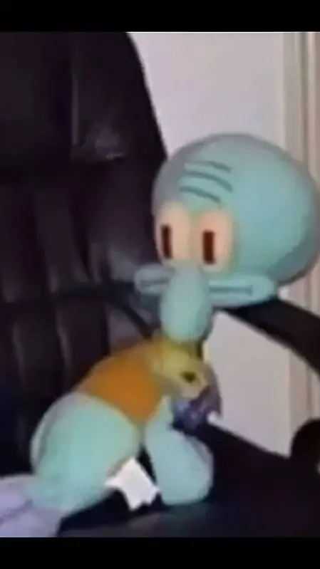 ai character: Squidward on chair background
