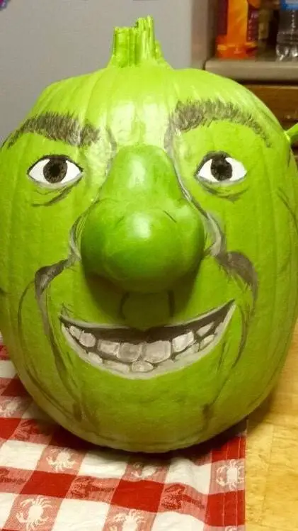 ai character: Shrek pumpkin background
