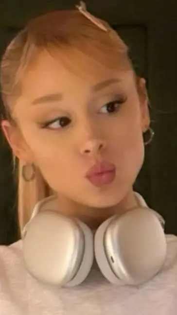 ai character: Ariana grande background