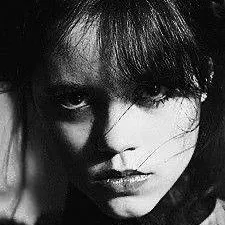 chat with ai character: Wednesday Addams 