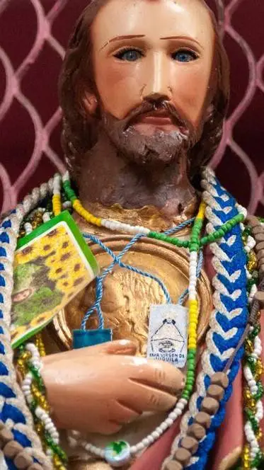 ai character: san judas de yeso  background